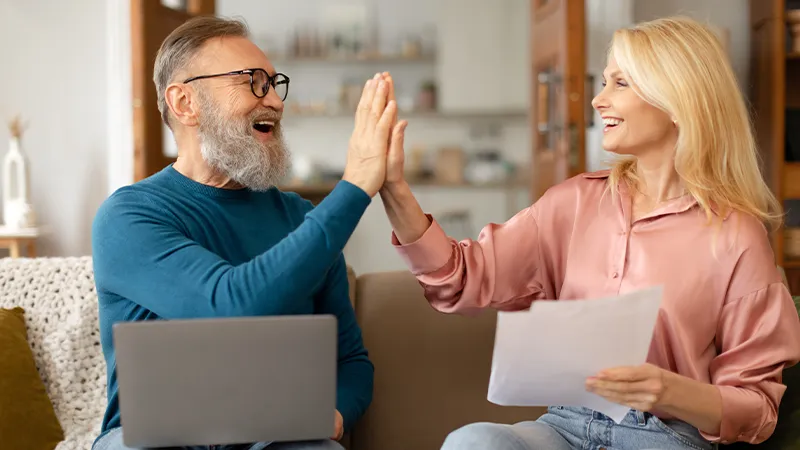 Happy family enjoying their new air conditioner installed by Bill's Heating & A/C