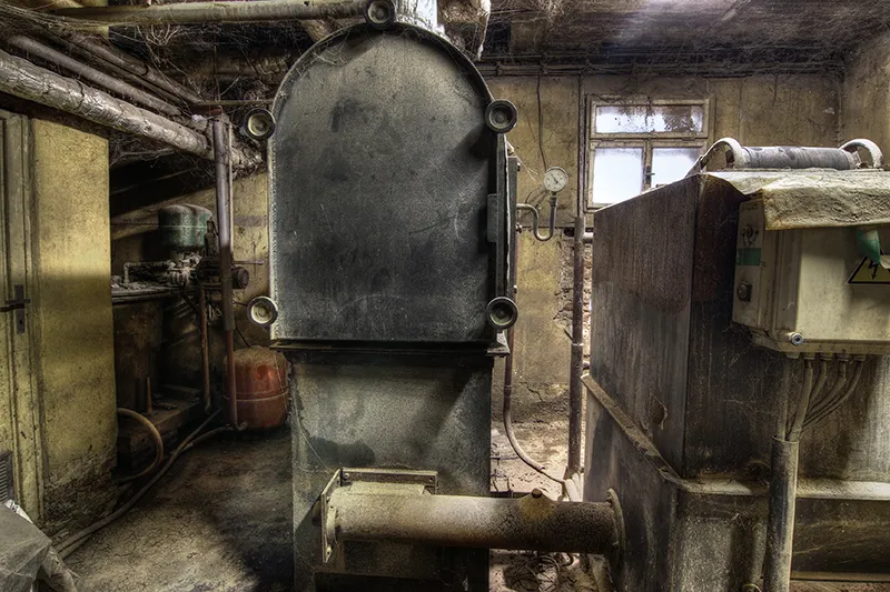 An old furnace in a basement